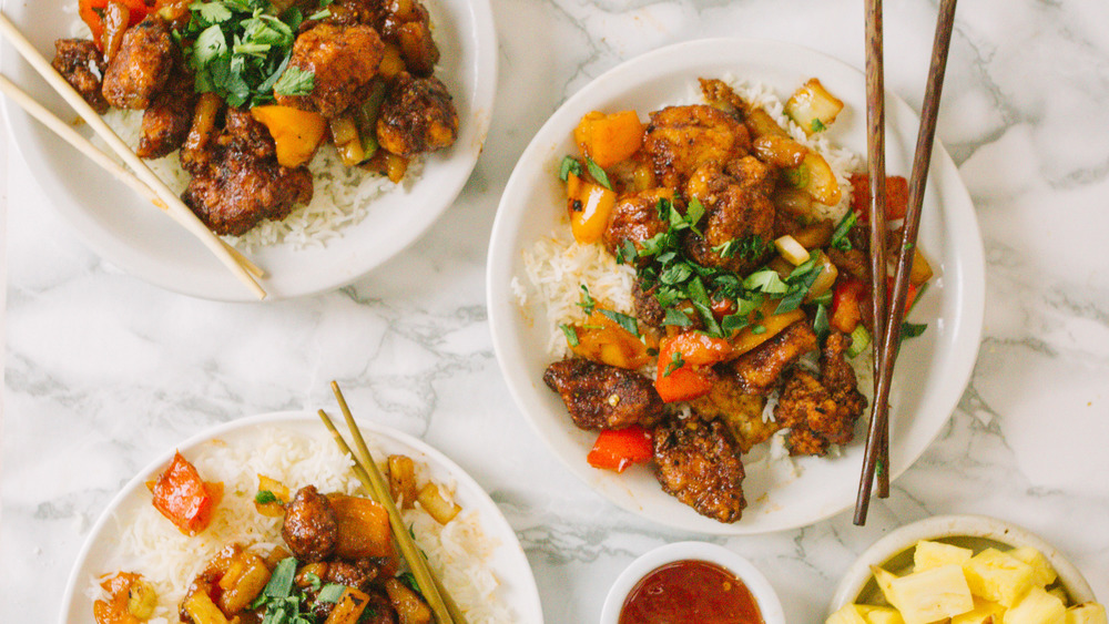 plates of sweet and sour chicken