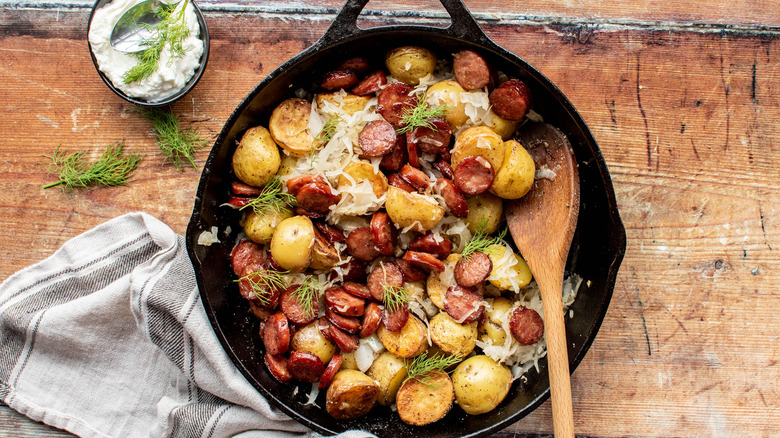 kielbasa and potatoes in skillet 