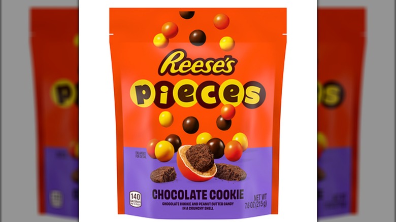 Bag of Reese's Pieces with chocolate cookie bits in the center.