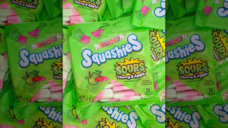 Bags of sour cherry and apple gummy candy.