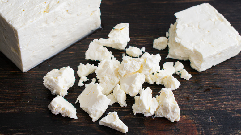 Block of feta crumbling