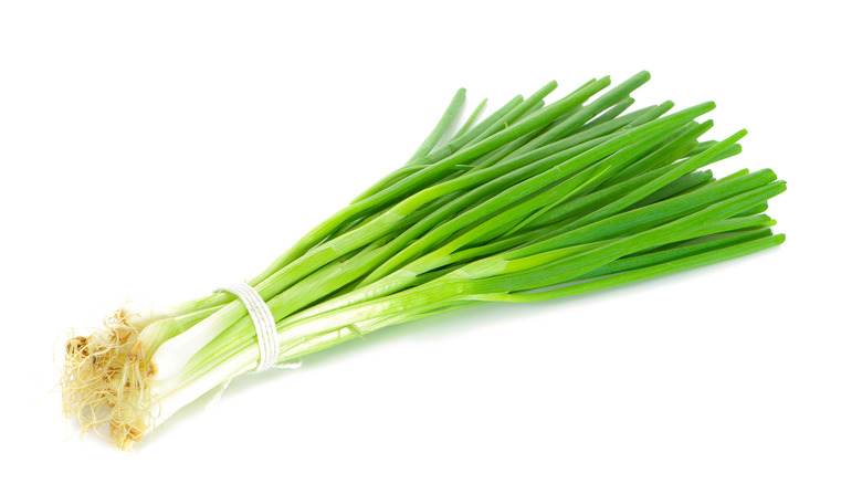 A pile of fresh green onions