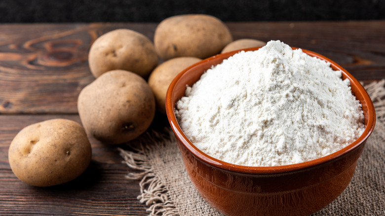 Potatoes and potato starch on a table