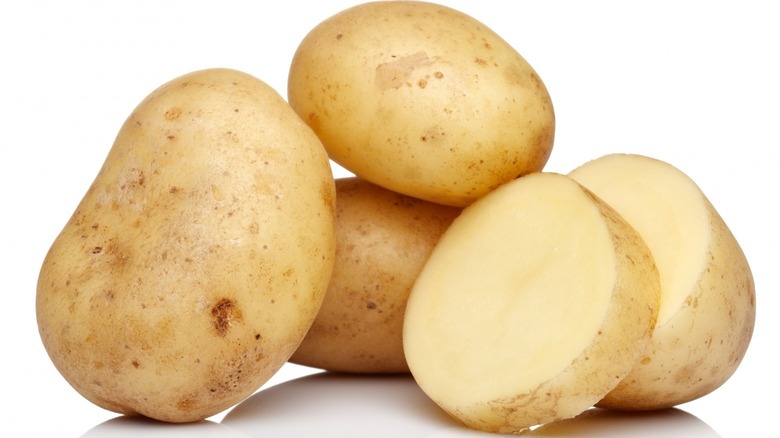 Big Potatoes Standing on a Pile