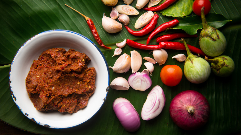 Red curry paste in a white dish