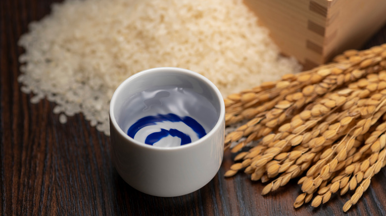 Sake with rice in background