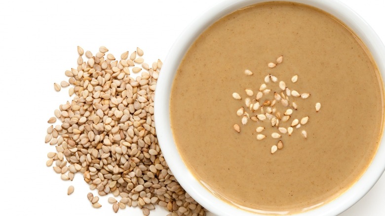 bowl of tahini with sesame seeds