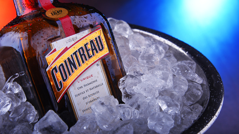 A bottle of Cointreau in ice