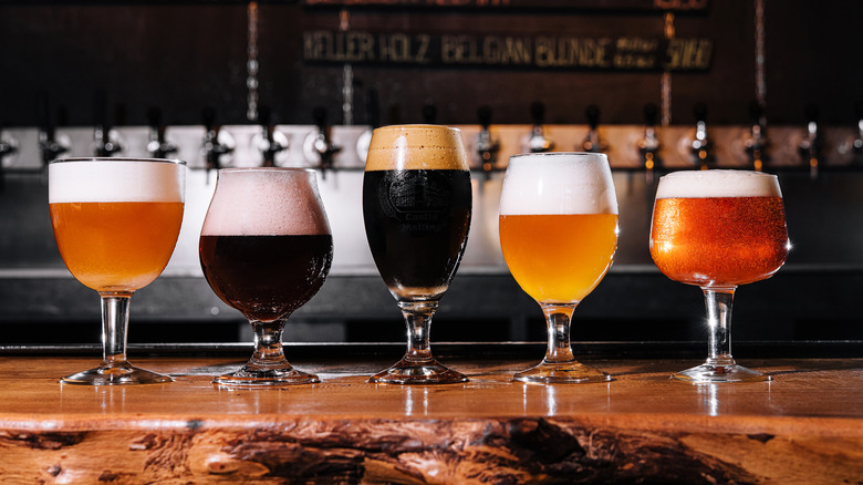 Different styles of craft beer on bar