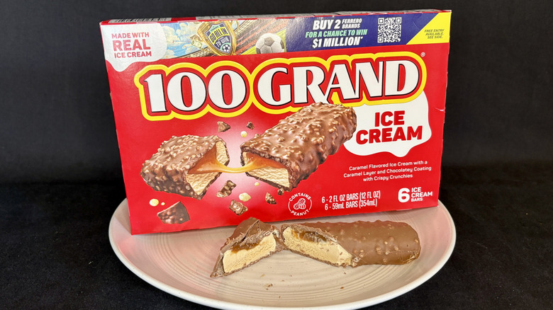 100 Grand ice cream bar cut open on plate with box in background