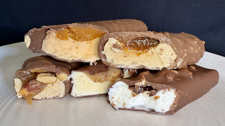 Cross section of various ice cream bars on a plate