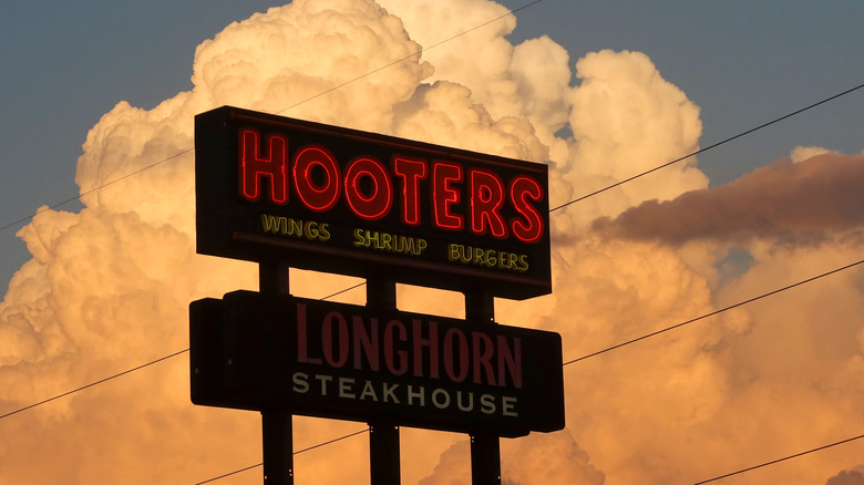 Sign for Hooters against setting sun