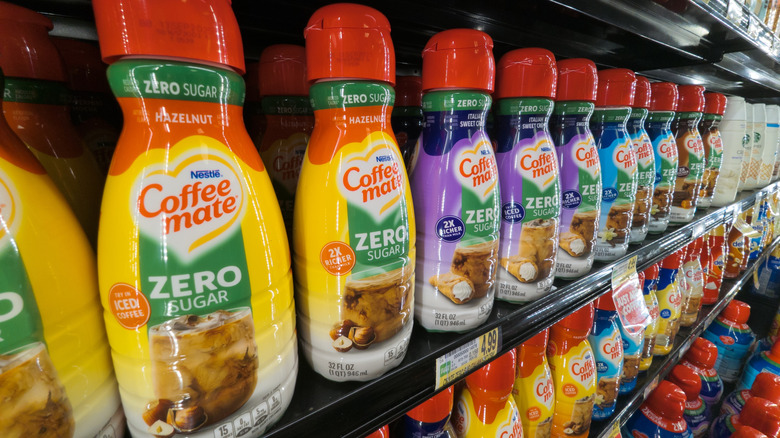 shelves full of Coffee Mate creamer