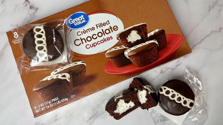 A box of Walmart Great Value brand creme filled chocolate cupcakes
