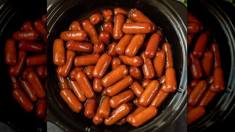 Cocktail smokies in a black crockpot
