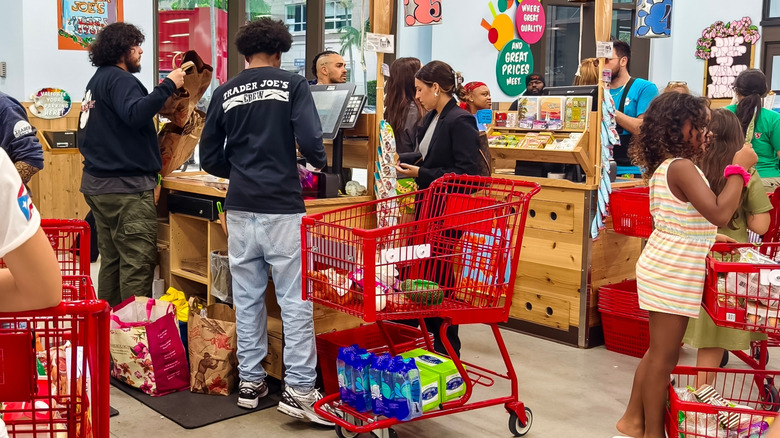 Customers at register at Trader Joe's