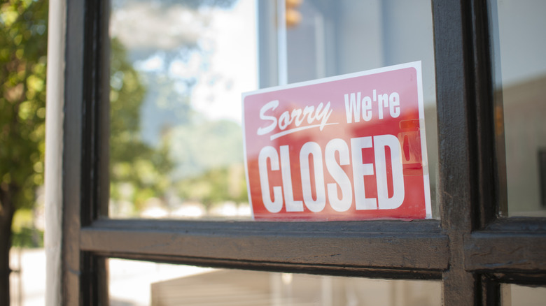 Closed sign in store window