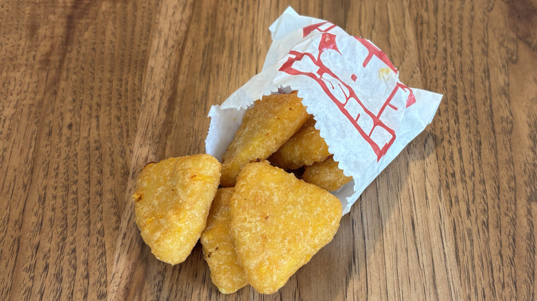 mac and cheese bites spilling out of Sheetz bag