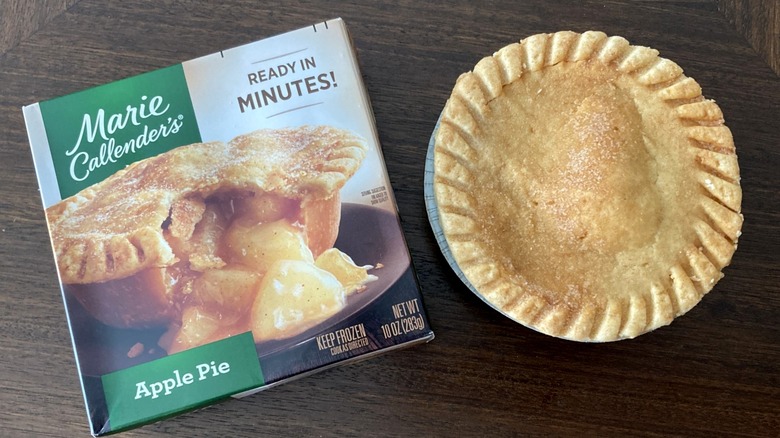 Marie Callender's personal-sized apple pie on wooden table