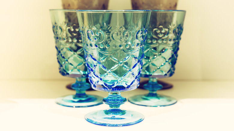 clear blue old fashioned embossed glasses
