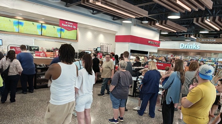 A busy Wawa full of customers