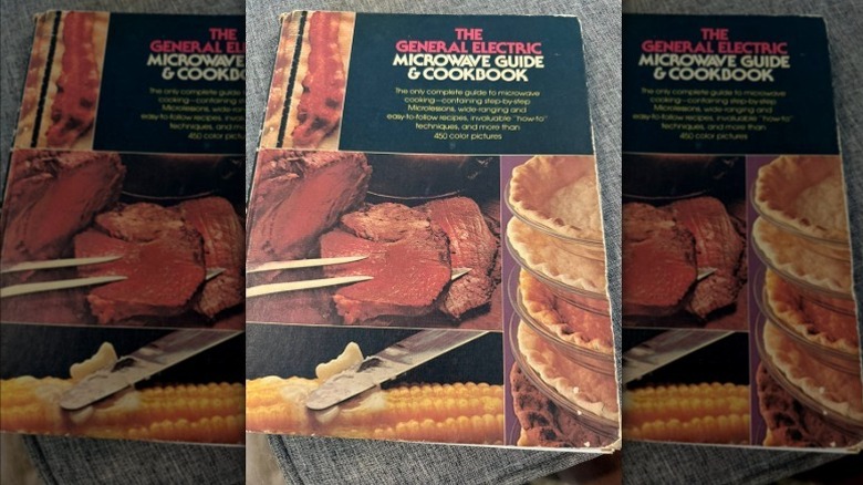 vintage microwave cookbook on a gray surface