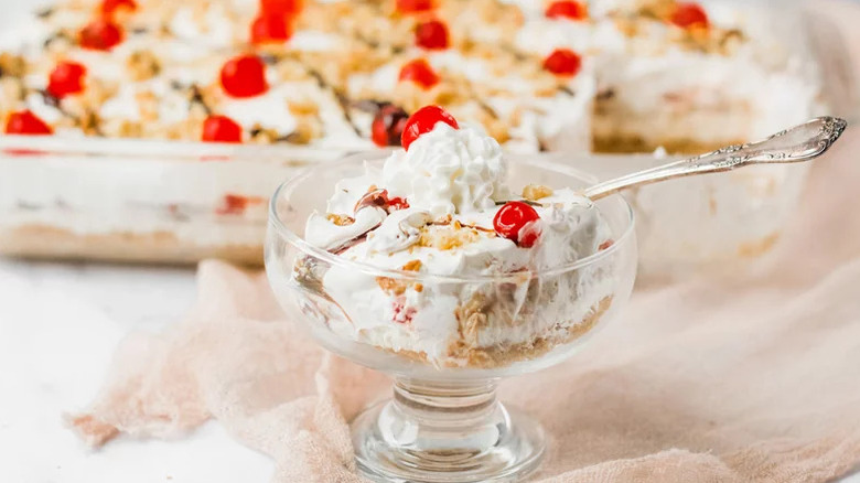 A glass dish with no-bake banana split cake