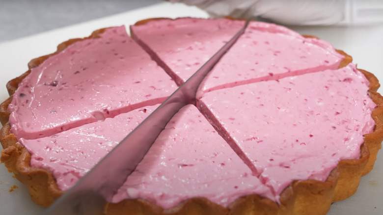 Pink lemonade pie being sliced