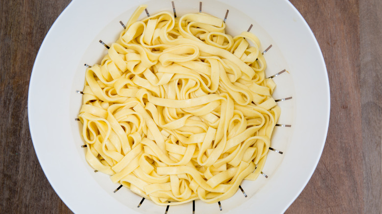 Cooked pasta in colander
