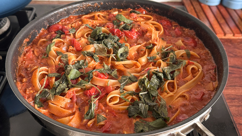 Pasta and sauce in skillet