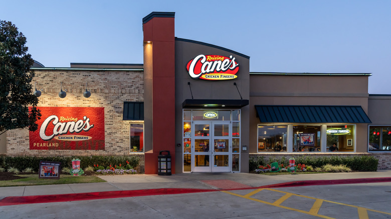 exterior of Raising Cane's lit up
