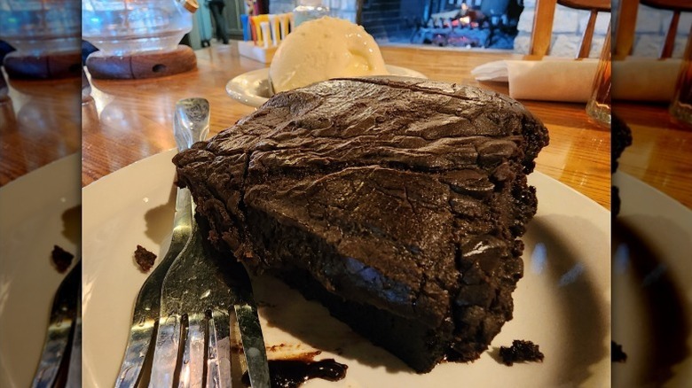 Cracker Barrel's double chocolate coca cola cake on a white plate