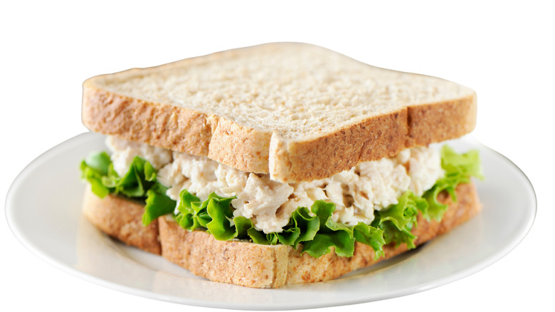 chicken salad sandwich on wheat bread with lettuce