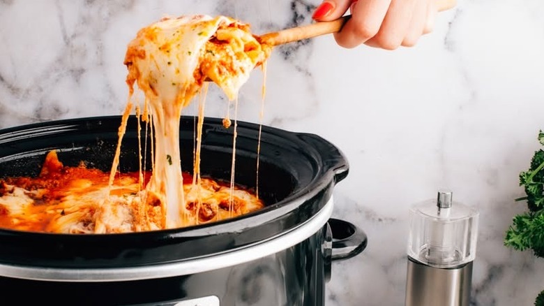 Close up of cheesy lasagna in a crockpot