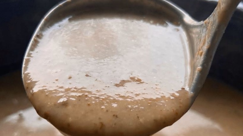 Close up of a thickened sauce or gravy from slow cooker