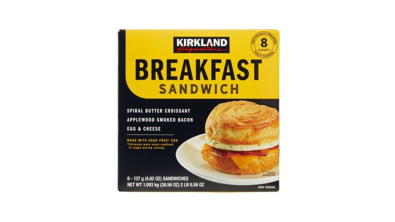 Box of Kirkland Signature crossiant breakfast sandwiches on a white background