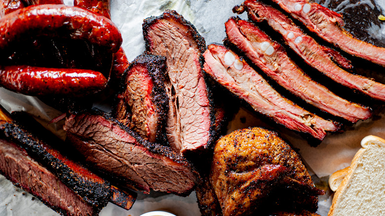 BBQ platter. Barbecue pork ribs, brisket, beef ribs and chicken served with classic bbq sides Mac n cheese, cornbread, Brussels sprouts, coleslaw & beer. Classic traditional Texas meats & side dishes.
