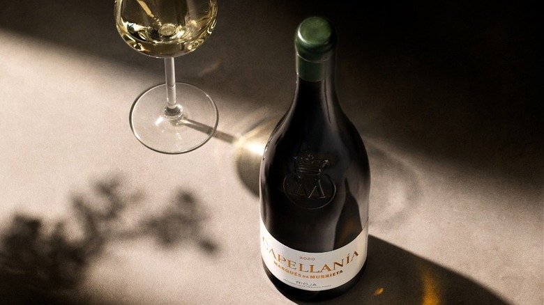 Bottle of Marqués de Murrieta Capellanía and glass