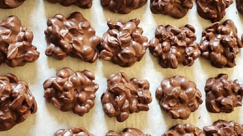 baking pan of chocolate peanut clusters