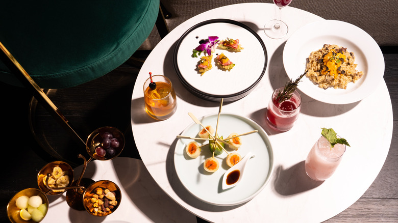 An array of small plate dishes on restaurant table