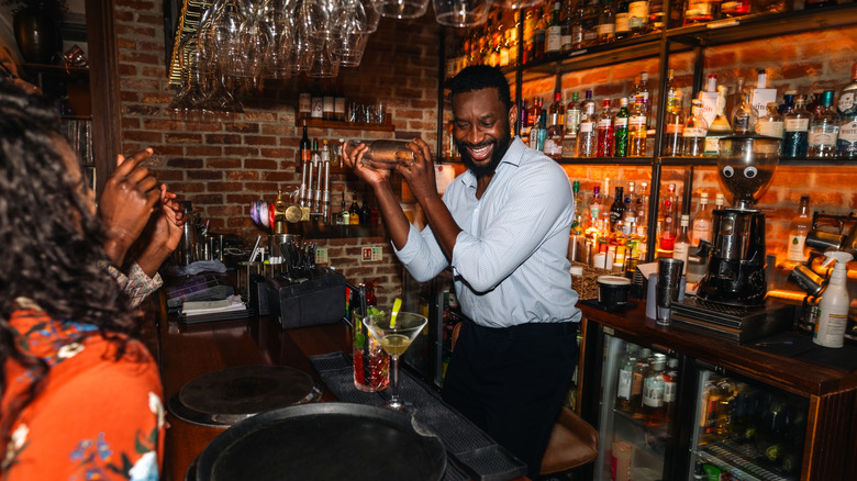 Bartender mixing cocktail