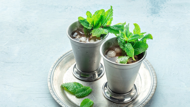 Mint Julep cocktails served in metal shakers