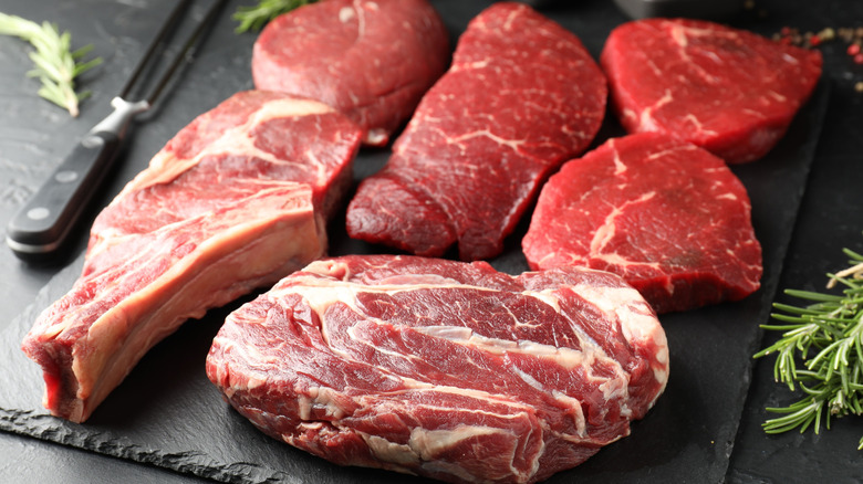 Different cuts of raw steak