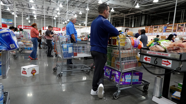 customers lined up at Costco registers