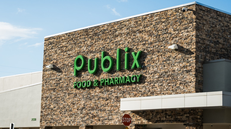 The outside of a Publix Food & Pharmacy building against a blue sky
