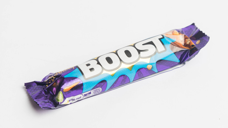 A Cadbury Boost chocolate bar in wrapper on white background