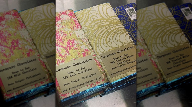 Bars of Dormouse Chocolates in paper wrappers, including toasted white and milk chocolate bars
