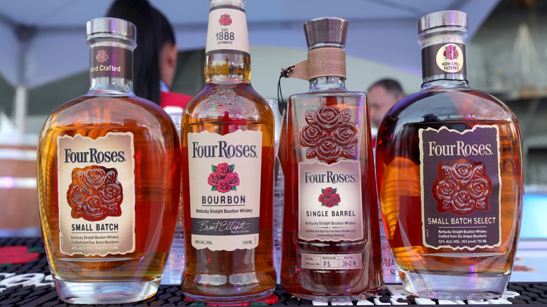 Various bottles of Four Roses bourbon on bartop