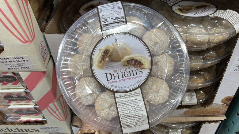Tub of dulce de leche pastries