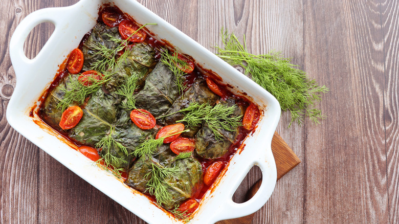 Stuffed Swiss chard rolls in a baking dish